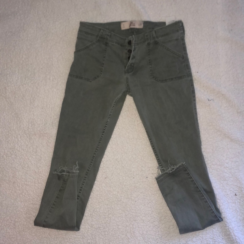 Green Hollister jeans.